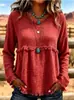 Blusa longa de manga comprida, estilo boho europeu e americano, com franjas, textura e amassada, gola redonda, corte solto e ombros caídos.