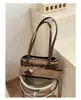 Bolso de axila texturizado transfronterizo para mujer, nuevo modelo 2026, bolso baguette de nicho de lujo ligero, bolso de trabajo, bolso tote vintage esmerilado