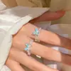 Anillo abierto estilo ins azul claro floral de circón, mariposa, chica de primavera, nicho, apilable, anillo de dedo de alta gama