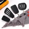 Utensilios de cocina de acero para muelles de silicona creativos transfronterizos, juego de cuatro piezas de sartén antiadherente, pala de silicona, pala elástica para bistec estilo occidental
