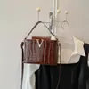 Bolso de mano con estampado de piedra, moda de lujo ligero, nuevo modelo 2026, bandolera de personalidad vintage, bolso pequeño tipo cubo de moda para mujer