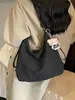 Bolsa Transversal Grande com Textura Feminina 2026 Outono Nova Retro de Ombro Único Popular Moda Trabalho Bolsa de Axila