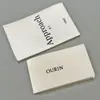 Suministro directo de fábrica de etiquetas tejidas de alta densidad para ropa, etiquetas de talla, marcas registradas, etiquetas de cuello, etiquetas tejidas con diseño personalizado, lavables