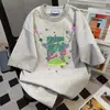 Camiseta Divertida com Estampa de Desenho Animado Marca da Moda Manga Curta Verão 2026 Novo Estilo Casual Preguiçoso Versátil