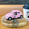 Llavero Creativo de Coche de Juguete Escarabajo de Doble Puerta Divertido Juguete de Descompresión para Estudiantes Colgante Regalo de Máquina de Garra Venta al por Mayor