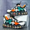 Sapatos de Menino 2026 Primavera/Verão Novos Tênis Esportivos Infantis Sapatos de Menino Botão Giratório Malha Respirável Moderno Verão