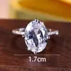 Anel Rongxing Cross-Border de Luxo Leve com Quatro Garras, Pedra Principal Oval, Aro Fino com Pedras Incrustadas, Anel Aberto para Jantar de Gala Feminino, Proposta