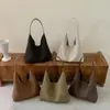 Bolso de mano transfronterizo para mujer, nueva colección otoño 2026, elegante y práctico para el trabajo y los desplazamientos, bolso de axila de alta calidad, bolso de hombro retro y minimalista