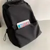 Mochila de Hombro Doble de Color Sólido de Gran Capacidad Estilo Coreano para Mujer Mochila Versátil Simple Mochila para Escuela Secundaria de Hombre Mochila de Doble Hombro para Estudiante Universitario Impermeable