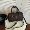 Otoño 2026 Nuevo Bolso Boston Simple de Alto Valor Estilo Coreano Moda de Nicho Elegante Bolso de Hombro Cruzado para Mujer