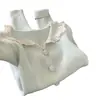 Suéter azul con cuello de muñeca ribeteado de encaje con capa base para mujer, nuevo top de punto de alta gama Otoño e Invierno 2025