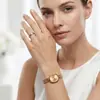Reloj popular para mujer transfronterizo, reloj versátil artístico de alto valor de nicho, simple y elegante para mujer con esfera ovalada