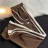 Pantalones de Pana para Hombre Primavera y Otoño Pierna Ancha Casuales 2025 Nueva Marca Trendy Retro Estilo Japonés Pantalones Largos Deportivos