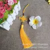 Un collar de cuentas de nudo Phnom Penh al por mayor con borla, placa de ocho nudos auspiciosos, colgante para coche, colgante de instrumento musical, nudo chino rosa Hanfu