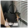 Bolso Cubo Casual de Moda Retro para Mujer 2026 Estilo Nuevo de Primavera Popular para Salir y Viajar Bolso de Hombro Texturizado
