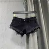 Shorts de Mezclilla Negros Sexys Estilo Spice Girls Verano Tendencia 2025 Nuevo Estilo Distintivo Cintura Baja Borde de Piel Ultra Cortos de Corte A Pantalones Calientes para Mujer