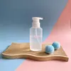 Botella exprimible para teñido de burbujas al por mayor, estilo nuevo, botella exprimible de espuma para permanente, botella caliente, cabeza de bomba para crema de tinte para el cabello, empaque