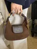 Colección Otoño 2026 para mujer de alta gama, versátil, a la moda y retro: Bolso de hombro, bolso de mano y bolso cruzado de nicho estilo japonés y coreano