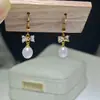 Pendientes de Zirconia con Lazo de Diseño Transfronterizo S925 Nicho Diseño de Alta Gama Pendientes de Perlas de Agua Dulce Naturales