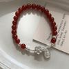 Pulsera con colgante de flor de ágata roja para mujer, regalo de nicho de alta gama para mejores amigas, pulsera de cuerda trenzada estilo chino nuevo