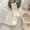 Meias grossas de lã quentes estilo japonês Youjiaxiu para mulheres no outono e inverno, até o meio da panturrilha, com padrão de losangos, emagrecedoras, de tricô grosso e com babados.