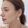 Moda y elegancia, clips para orejas de perla sin perforación para mujer, vintage de lujo ligero, pendientes versátiles de circón para estudiantes, venta al por mayor
