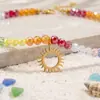 Joyería transfronteriza europea y americana: Collar de acero inoxidable con colgante de sol hueco y cuentas de cristal multifacético de colores del arcoíris para mujer