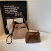 Bolso de Mano de Moda de Nicho Tipo Cubo para Mujer 2026 Verano Nuevo Moda Retro para el Trabajo Bajo el Brazo Hombro Cruzado
