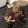 Bolsa de almofada vintage transfronteiriça para outono e inverno para mulheres, novo modelo 2026, bolsa de mão de design de nicho de alta qualidade, bolsa de ombro e transversal