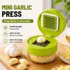1 Peça Mini Picador e Espremedor de Alho VERDE com Recipiente, Triturador Manual de Alho, Ferramenta Manual de Aço Inoxidável para Fatiar e Picar Alho Zoom