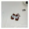 Versión coreana de guantes de cinco dedos para niños otoño e invierno retro lunares contraste de color guantes de dedo para niños y niñas estudiantes guantes de escritura lote