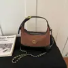Bolso vintage de gamuza de nicho para mujer, bolso cruzado versátil y elegante con cadena acolchada, bolso de hombro y axila de moda con bloques de color