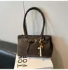 Bolsa Estilo Preguiçoso Retrô Feminina 2025 Nova Moda Outono e Inverno Versátil Bolsa de Axila Simples Bolsa de Ombro para o Dia a Dia