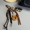 Lindo Colgante para Bolso Estilo Coreano de Pan Alcalino Colgante Cadena Colgante Decorativa de Llavero de Cuerda de Escalada de Chocolate