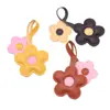 Nuevo Colgante Colgante de Flor de Color Contrastante de Cuero Transfronterizo para Bolso de Mujer Llavero Creativo de PU de Girasol de Cinco Pétalos Correa