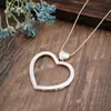 Colar Longo Cruzado Quente Geométrico Flor Vazada Amor Feminino Pingente Irregular Escovado Exagerado de Alta Qualidade
