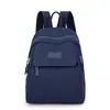 Mochila de mujer bolsa de tela de nailon nueva moda simple mochila escolar mini para damas ocio viaje mochila pequeña venta al por mayor