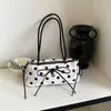 Diseño de nicho de lunares de gran capacidad 2026 primavera nuevo moda elegante de alta calidad de alto valor bolso de hombro