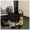 Bolso de mano tipo dumpling de diseño nicho transfronterizo, nuevo bolso de axila casual y moderno para mujer, adecuado para el trabajo y los desplazamientos, bolso de hombro, bolso cruzado, moderno