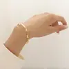Pulsera Zhenxi Estilo Ins No se decolora Trenzado de línea Diseño abierto Acero de titanio Joyería de oro de 18 quilates Estilo geométrico minimalista