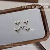 Joyería para Uñas Starburst Aleación Circonita Montón Diamante Alas Colgante Estrella Cuatro Picos Diamante Accesorios Decoraciones para Uñas