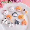 Set de gatito de dibujos animados cabezazo de perro accesorios de resina al por mayor hechos a mano material diy accesorios funda para teléfono móvil imanes para refrigerador