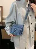 Bolso de mezclilla para mujer, simple y casual, nuevo bolso de mano de moda 2026, bolso de hombro versátil casual, bolso cruzado