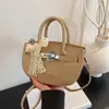 Bolsa Sela Simples Portátil Estilo Francês Feminina 2025 Nova Versátil Padrão Lichia Bolsa Platina Bolsa Transversal Fashion