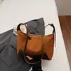 Bolsa Pequena de Camurça Bolsa Feminina 2026 Nova Bolsa Retrô Bolinho Outono e Inverno Versátil Roupas de Trabalho Bolsa de Ombro Transversal