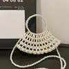 Bolso de Mano de Diseño de Nicho Estilo Retro Francés Bolso de Perlas para Mujer 2026 Nuevo Estilo de Verano Bolso Cruzado Tejido a Mano