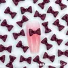 Jóias de unha de arco explosivo resina tridimensional pequeno arco diy decoração de unhas acessórios Joker atacado