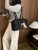 Bolso de hombro de nailon liso, transfronterizo, súper popular, nuevo estilo 2026, simple y moderno, bolsa tote casual para ir al trabajo, bolso de mujer