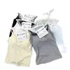 3567 # Camisola tipo dos piezas falsas cruzada al hombro con copas, adelgazante, adecuada para usar por dentro o por fuera, con un hermoso diseño en la espalda, para mujer