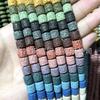 Cuentas cilíndricas de roca volcánica de color cuentas sueltas de piedra volcánica al por mayor accesorios de joyería DIY cuentas de piedra volcánica negra